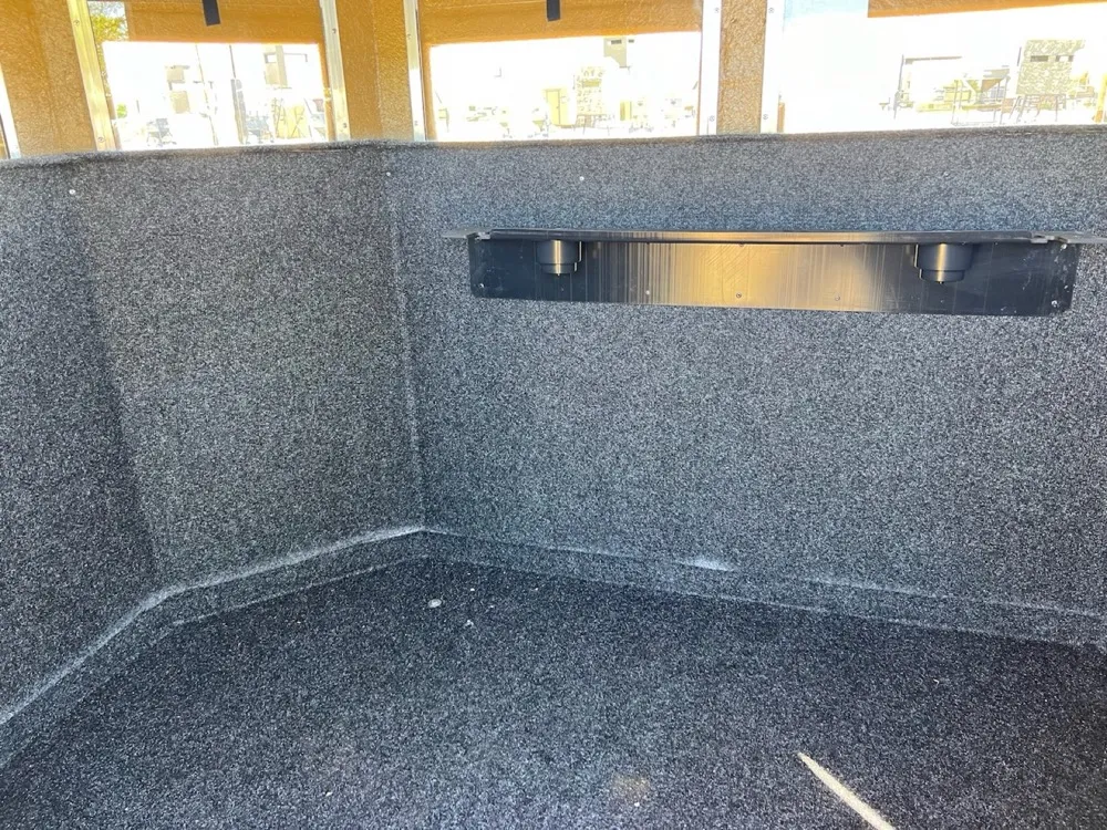 Carpeted walls and rifle rest
